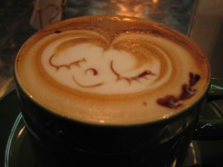 face on cappuccino